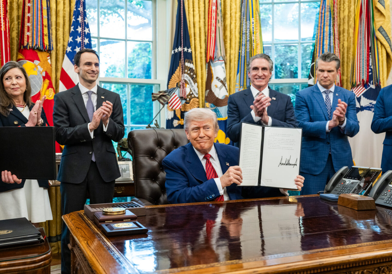 President Donald Trump signs executive orders regarding nuclear energy, Friday, May 23, 2025, in the Oval Office. (Official White House Photo by Molly Riley)