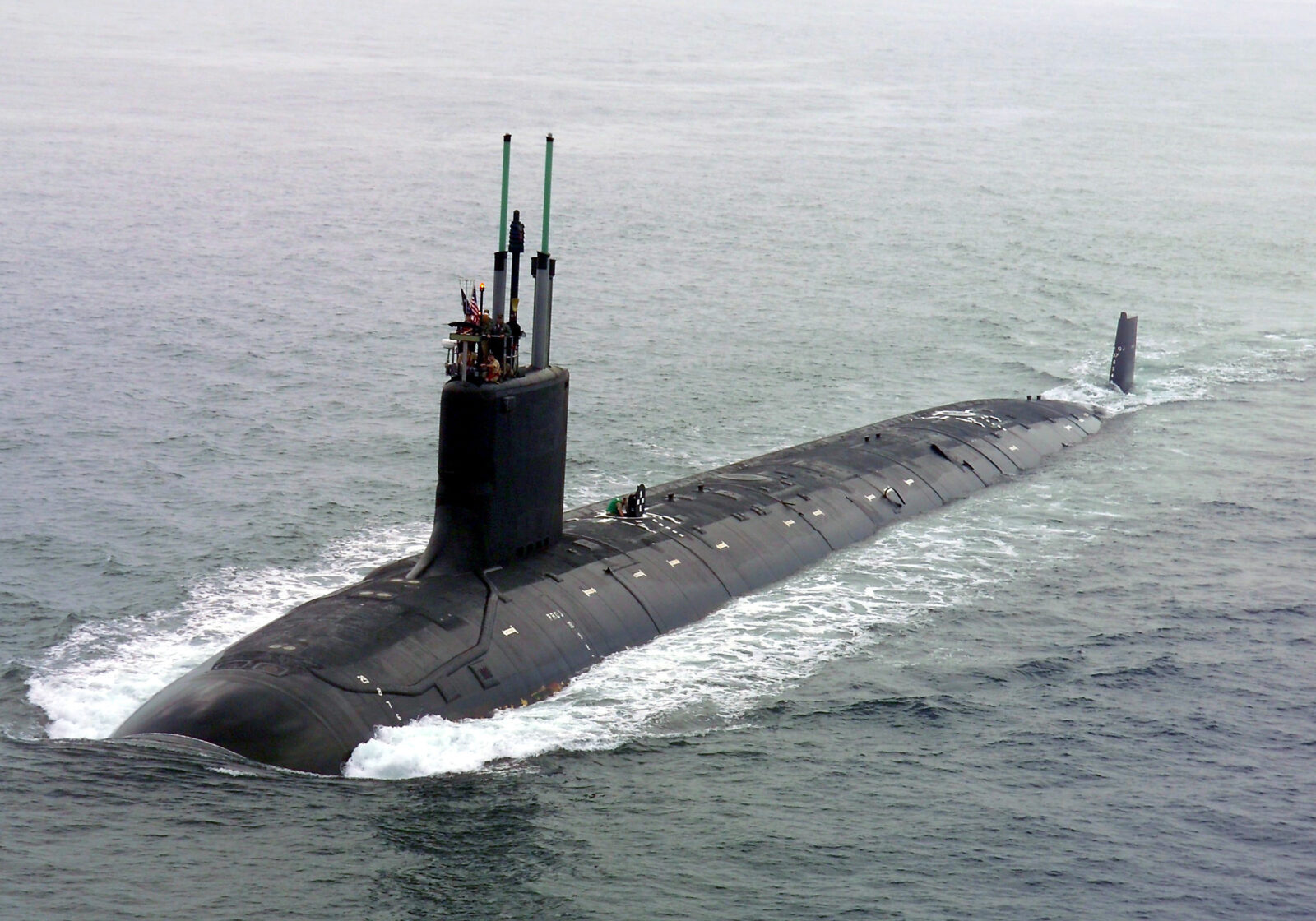 040730-N-1234E-002
Groton, Conn. (July 30, 2004) - The nationÕs newest and most advanced nuclear-powered attack submarine and the lead ship of its class, PCU Virginia (SSN 774) returns to the General Dynamics Electric Boat shipyard following the successful completion of its first voyage in open seas called "alpha" sea trials. Virginia is the NavyÕs only major combatant ready to join the fleet that was designed with the post-Cold War security environment in mind and embodies the war fighting and operational capabilities required to dominate the littorals while maintaining undersea dominance in the open ocean. Virginia and the rest of the ships of its class are designed specifically to incorporate emergent technologies that will provide new capabilities to meet new threats. Virginia will be delivered to the U.S. Navy this fall. U.S. Navy photo by General Dynamics Electric Boat (RELEASED)